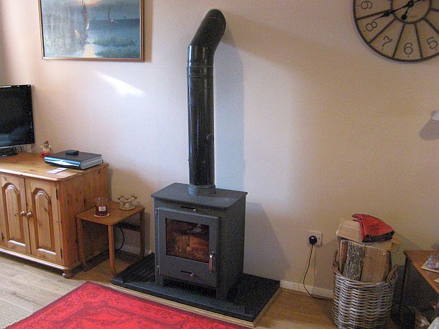Old inefficient wood burning stove near Stamford before inspection, removal and replacement by Fotheringhay Woodburners