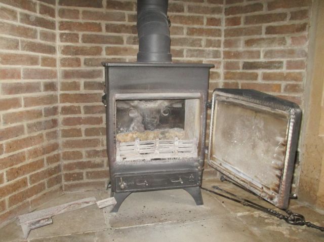 Woodwarm Fireview 5kW multifuel near Stamford before service by Fotheringhay Woodburners
