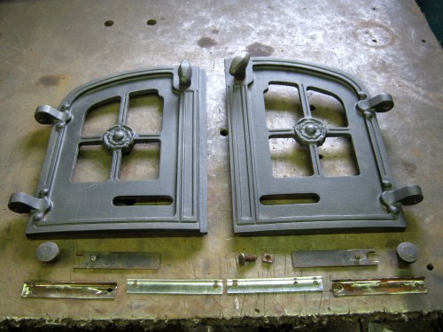 Outside of Yeoman stove doors after cleaning and repainting by  Fotheringhay Woodburners