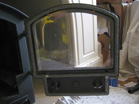 Refurbished stove door with new rope seal re-fitted by Fotheringhay Woodburner's service engineer