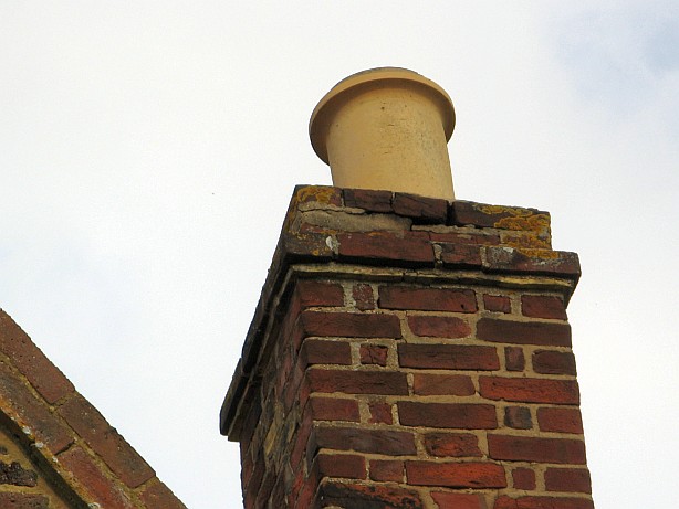 Scaffolding is needed to safely access and rebuild this chimney