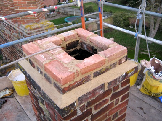 Lime based mortar and matching bricks have been used for chimney repairs