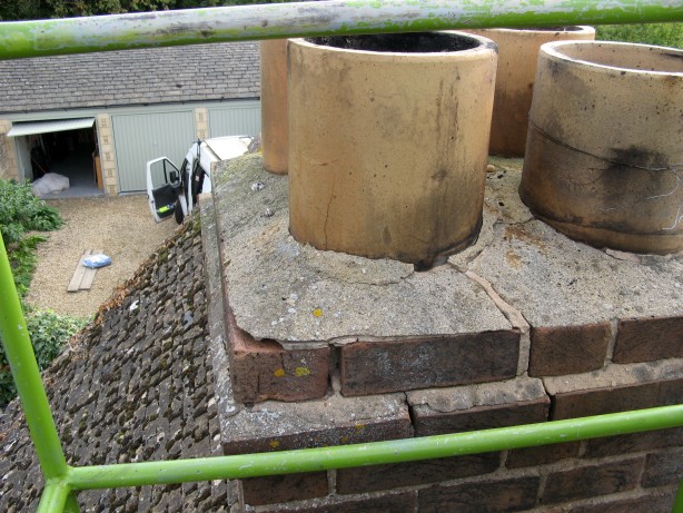 Cherry picker used to access chimney to avoid damage to fragile Collyweston slates