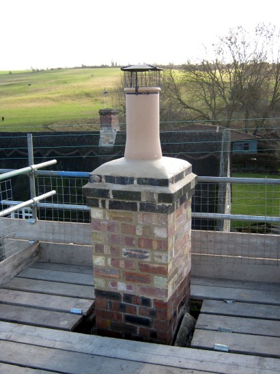 Chimney pot fitted to satisfy Building Control Officer