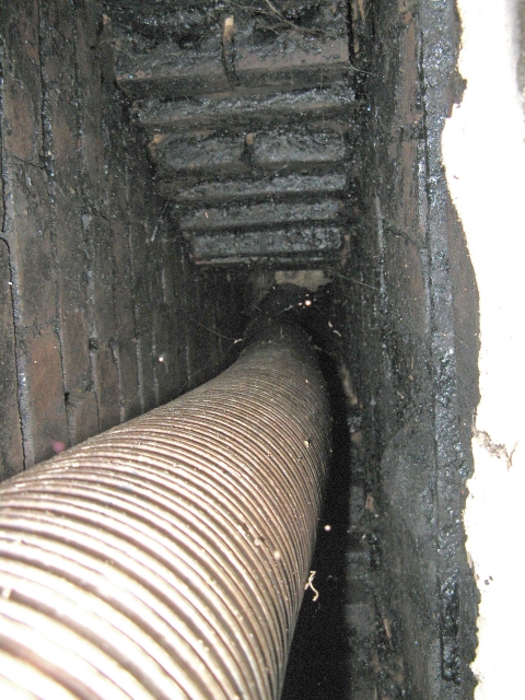 Old flexible stainless steel chimney liner in Victorian brick chimney can't be re-used
