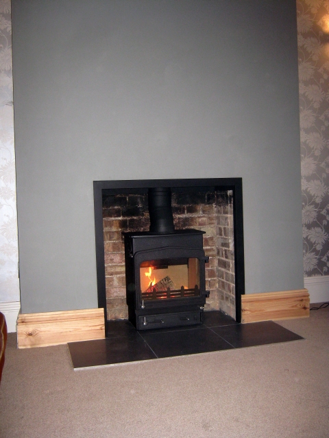Efficient Woodwarm Fireview multifuel stove installed by Fotheringhay Woodburners.