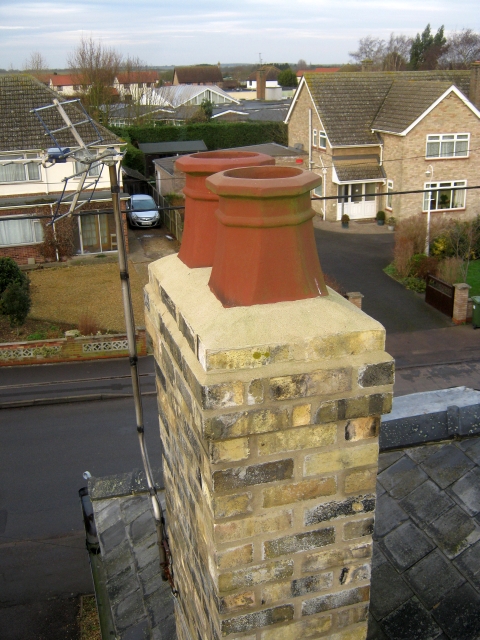 Chimney pots secure and flaunching in good condition before flexible liner installation