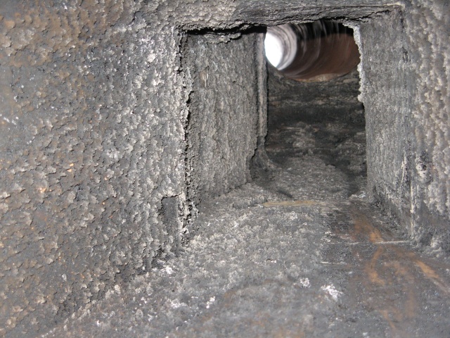 Poor chimney design before alteration and installation of new twin wall insulated stainless steel system chimney by Fotheringhay Woodburners