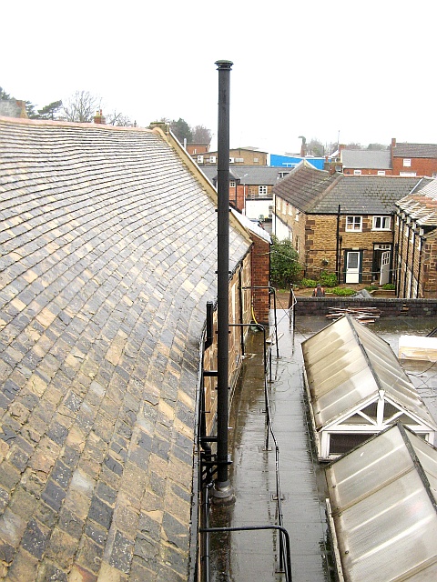 New stainless steel insulated system chimney installed  by Fotheringhay Woodburners' HETAS engineers