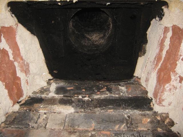 Chimney swept during Woodwarm inset multifuel stove installation