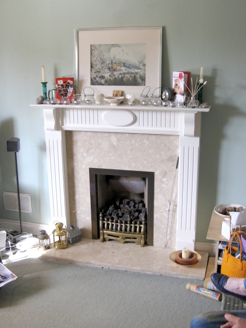 Old gas fire and fireplace will be removed and fireplace altered