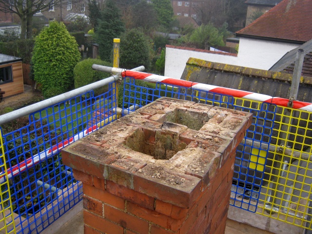 Top two courses of unsafe masonry removed ready for Fotheringhay Woodburners to rebuild the chimney