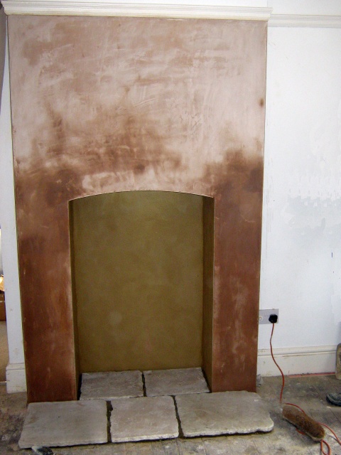 New chimney breast built by Fotheringhay Woodburners' recommended builder with new curved steel arch support and stone hearth