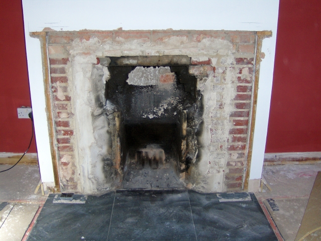 Marble fire surround removed and taken to be altered by Fotheringhay Woodburners' recommended stonemason