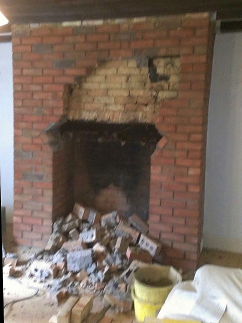Fireplace alteration and installation of new stone hearth by Fotheringhay Woodburners