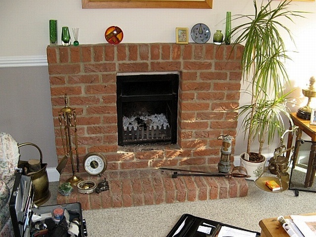 Modern inefficient open fireplace to be replaced by Fotheringhay Woodburners