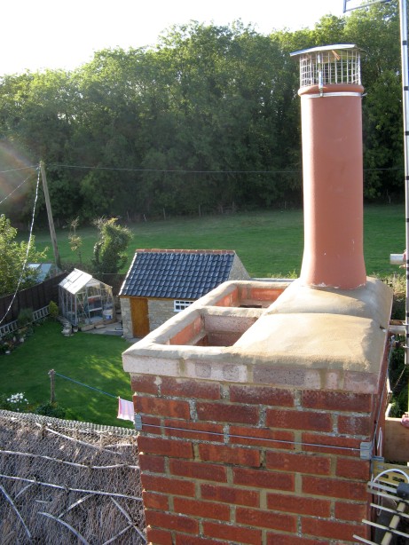 Chimney is now relined and chimney pot are fitted on new brickwork
