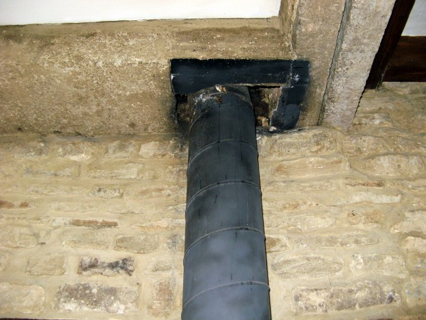 Rotted register plate and dangerous flue pipe