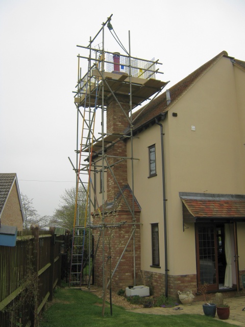 Scaffolding erected for safe access to the chimney ready for the Fotheringhay Woodburners HETAS installer to fit new stainless steel flexible liner