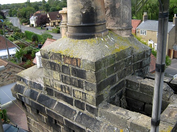 Clients chimney is accessed via scaffolding wihtout interfering with neighbours chimney