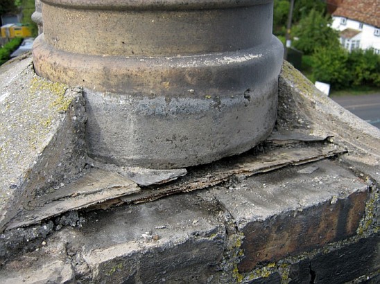 The plywood oringally used in this chimney has already started to burn through