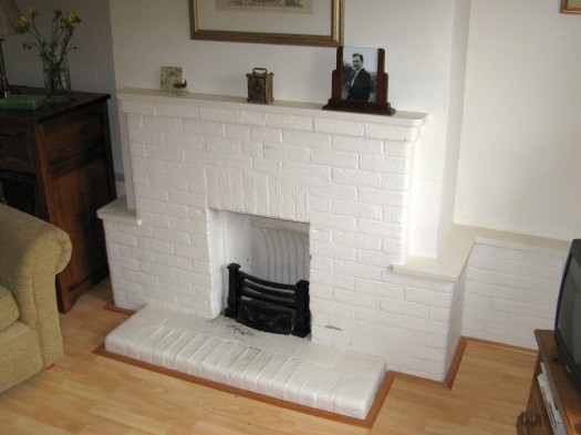 Existing open fire dominating room