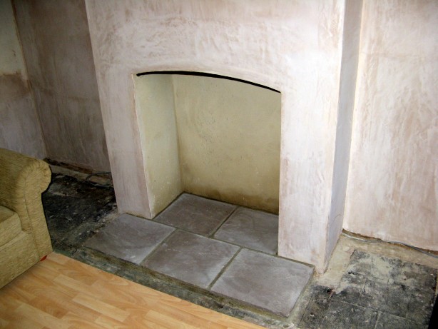 Newly built fireplace with fitted sandstone hearth