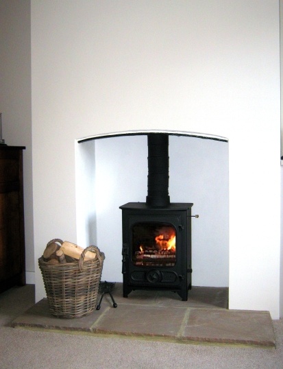 Charnwood Country 4 multifuel stove installed in new fireplace